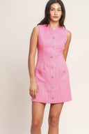 
A woven tweed mini dress featuring round neckline, sleeveless, jewel button down with pockets and back zipper closure

Details:

Self : 100% Polyester
Lining : 100% Polyester

Size &amp; Fit

- Model is 5`8" And Wearing Size Small
- Measurements Taken From Size Small
- Approx. Length: 35" Flying Tomato