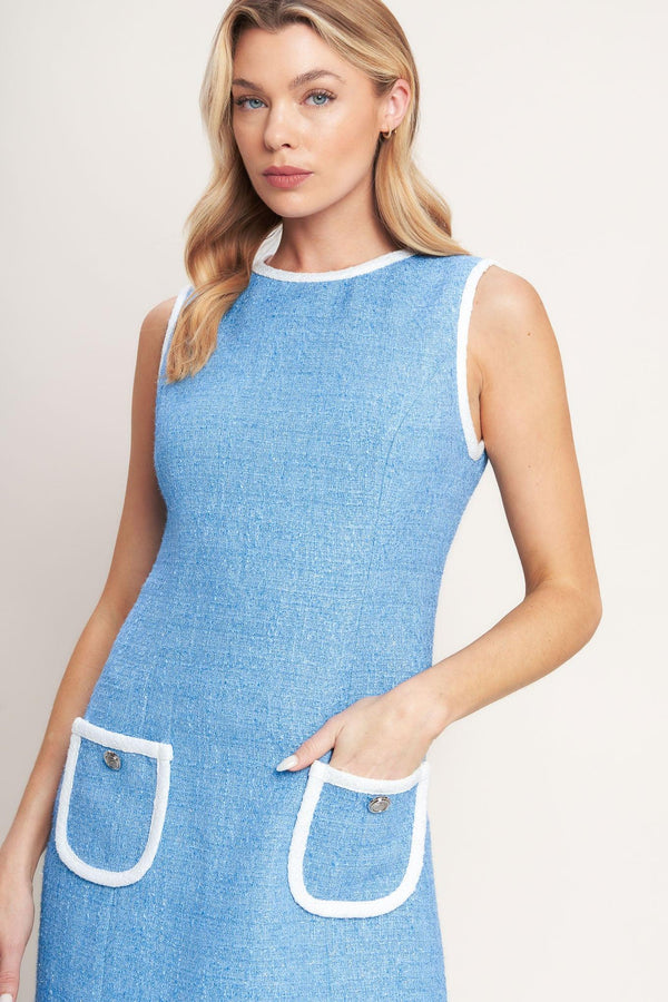 A solid woven mini dress with round neckline, sleeveless, pockets and back zipper closure

Details:

Self: 73% Polyester 27% Rayon

Contrast: 73% Polyester 27% Rayon

Lining: 100% Polyester

Size & Fit

-Model is 5`8" And Wearing Size Small 
-Measurements Taken From Size Small
-Approx. Length: 34"
