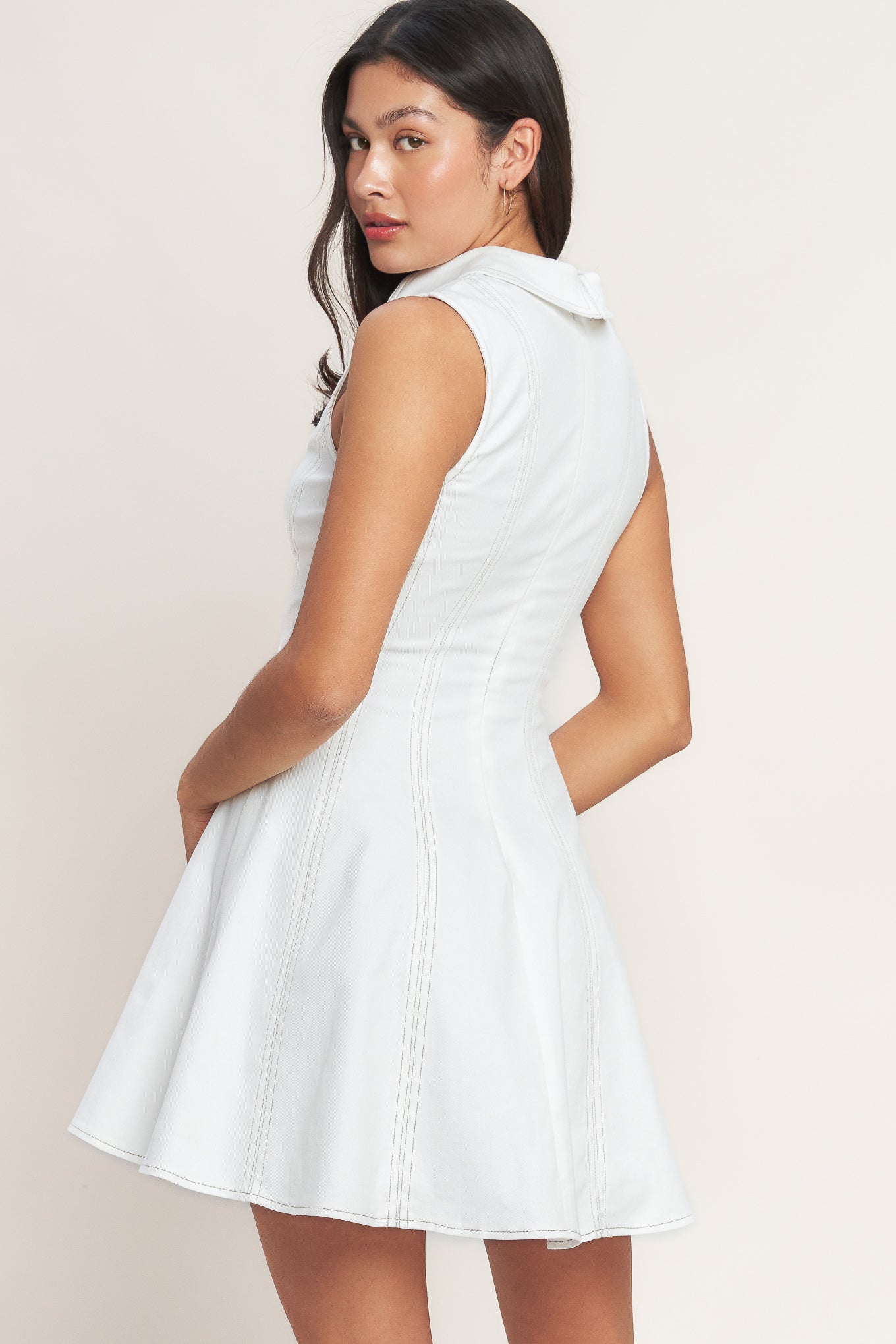 
A solid woven mini dress featuring collar, V neckline, sleeveless, circle skirt and back zipper closure

Details:

Self : 97% Cotton 3% Spandex

Size &amp; Fit

- Model is 5`8" And Wearing Size Small
- Measurements Taken From Size Small
- Approx. Length: 35" FLYING TOMATO