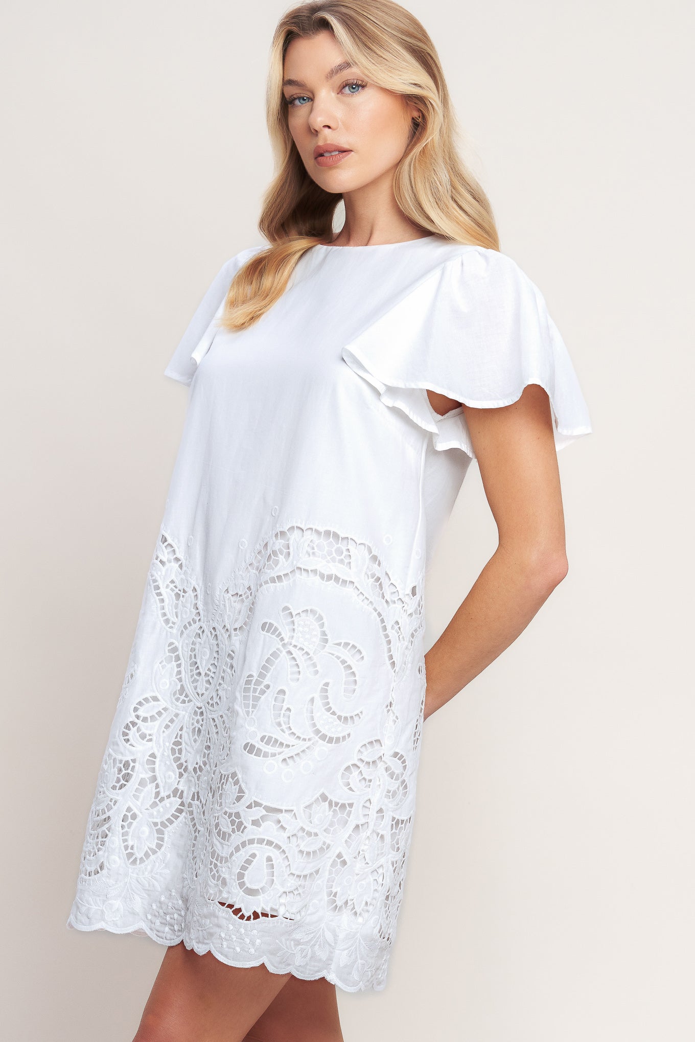 A solid woven eyelet dress with round neckline, flutter sleeve and back neck button closure

Details: 

Self: 100% Cotton

Lining: 100% Polyester

Size & Fit

-Model is 5`8" And Wearing Size Small
-Measurements Taken From Size Small
-Approx. Length: 35"