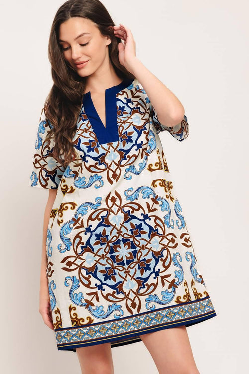 A printed woven mini dress featuring round neckline with V front and short sleeve

Details:

Self: 100% Cotton

Size & Fit

-Model is 5`8" And Wearing Size Small
-Measurements Taken From Size Small
-Approx. Length: 35"