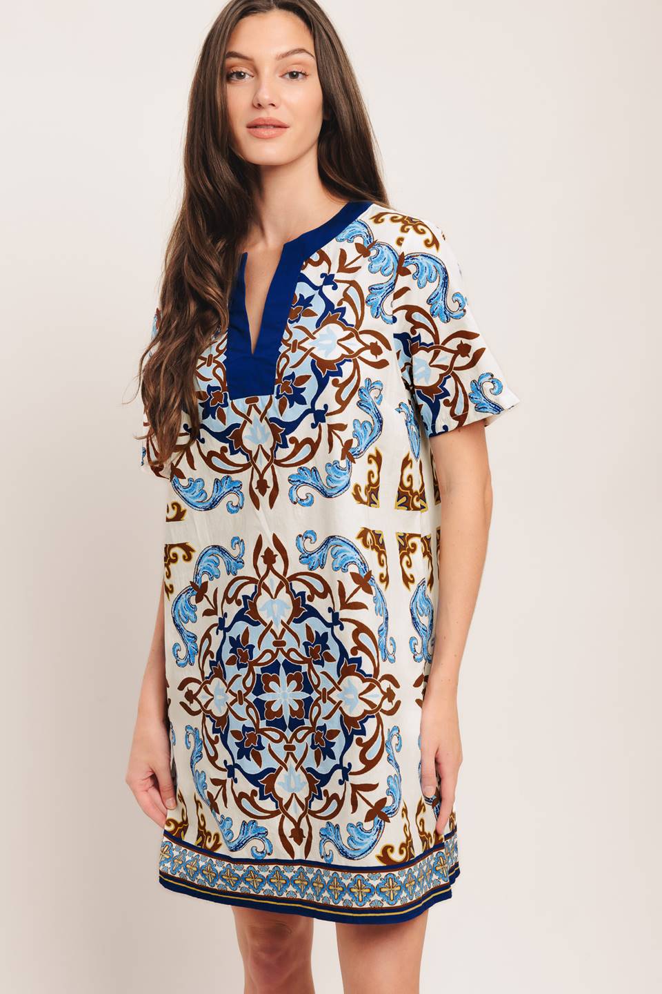 A printed woven mini dress featuring round neckline with V front and short sleeve

Details:

Self: 100% Cotton

Size & Fit

-Model is 5`8" And Wearing Size Small
-Measurements Taken From Size Small
-Approx. Length: 35"