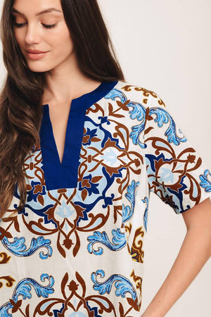 A printed woven mini dress featuring round neckline with V front and short sleeve

Details:

Self: 100% Cotton

Size & Fit

-Model is 5`8" And Wearing Size Small
-Measurements Taken From Size Small
-Approx. Length: 35"