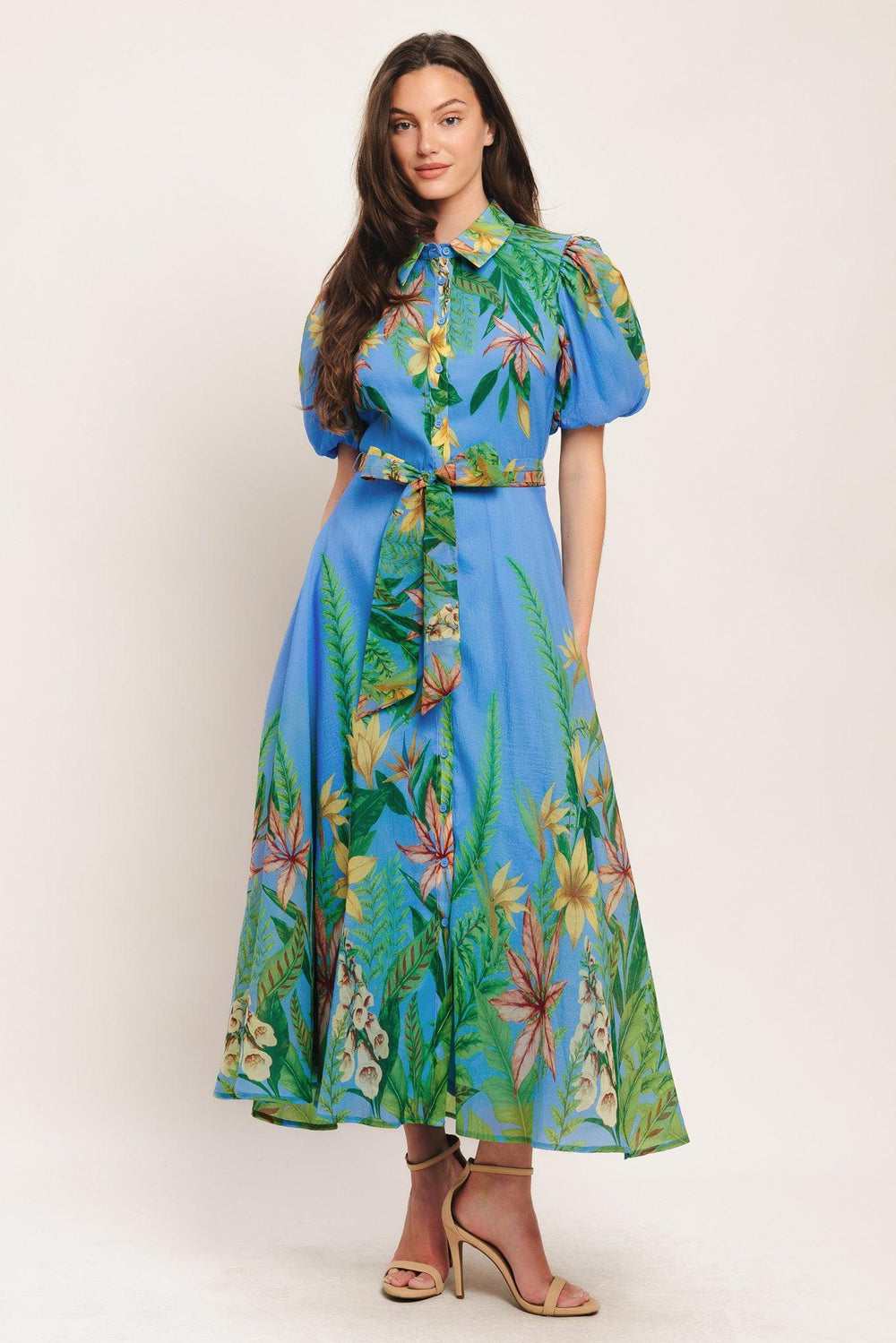 A printed woven midi dress featuring collar, short puff sleeve, button down, circle skirt and self sash tie

Details:

Self: 100% Polyester

Lining: 100% Polyester

Size & Fit

-Model is 5`8" And Wearing Size Small
-Measurements Taken From Size Small
-Approx. Length: 54"