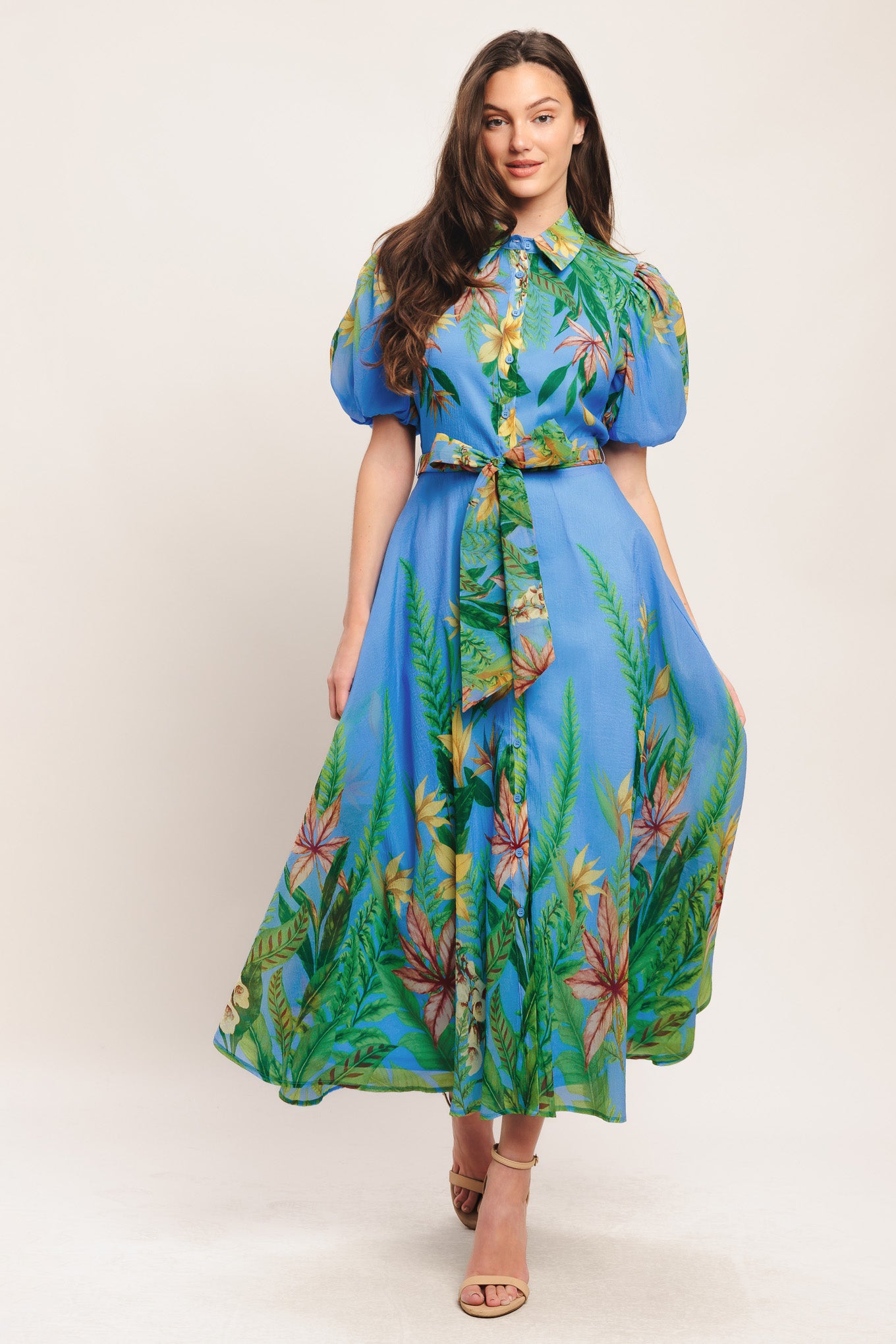 A printed woven midi dress featuring collar, short puff sleeve, button down, circle skirt and self sash tie

Details:

Self: 100% Polyester

Lining: 100% Polyester

Size & Fit

-Model is 5`8" And Wearing Size Small
-Measurements Taken From Size Small
-Approx. Length: 54"