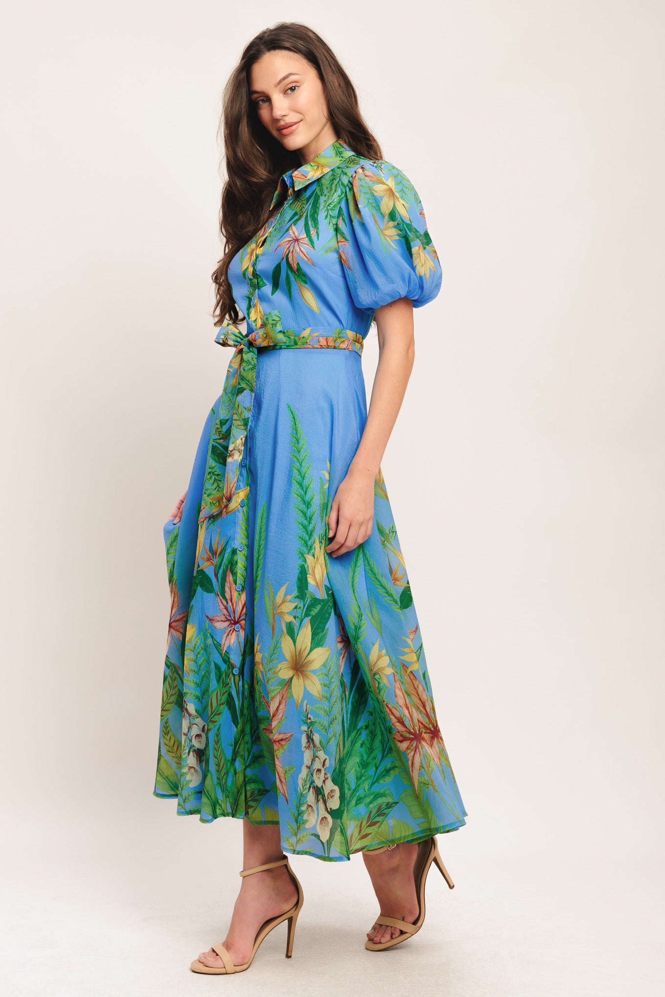A printed woven midi dress featuring collar, short puff sleeve, button down, circle skirt and self sash tie

Details:

Self: 100% Polyester

Lining: 100% Polyester

Size & Fit

-Model is 5`8" And Wearing Size Small
-Measurements Taken From Size Small
-Approx. Length: 54"