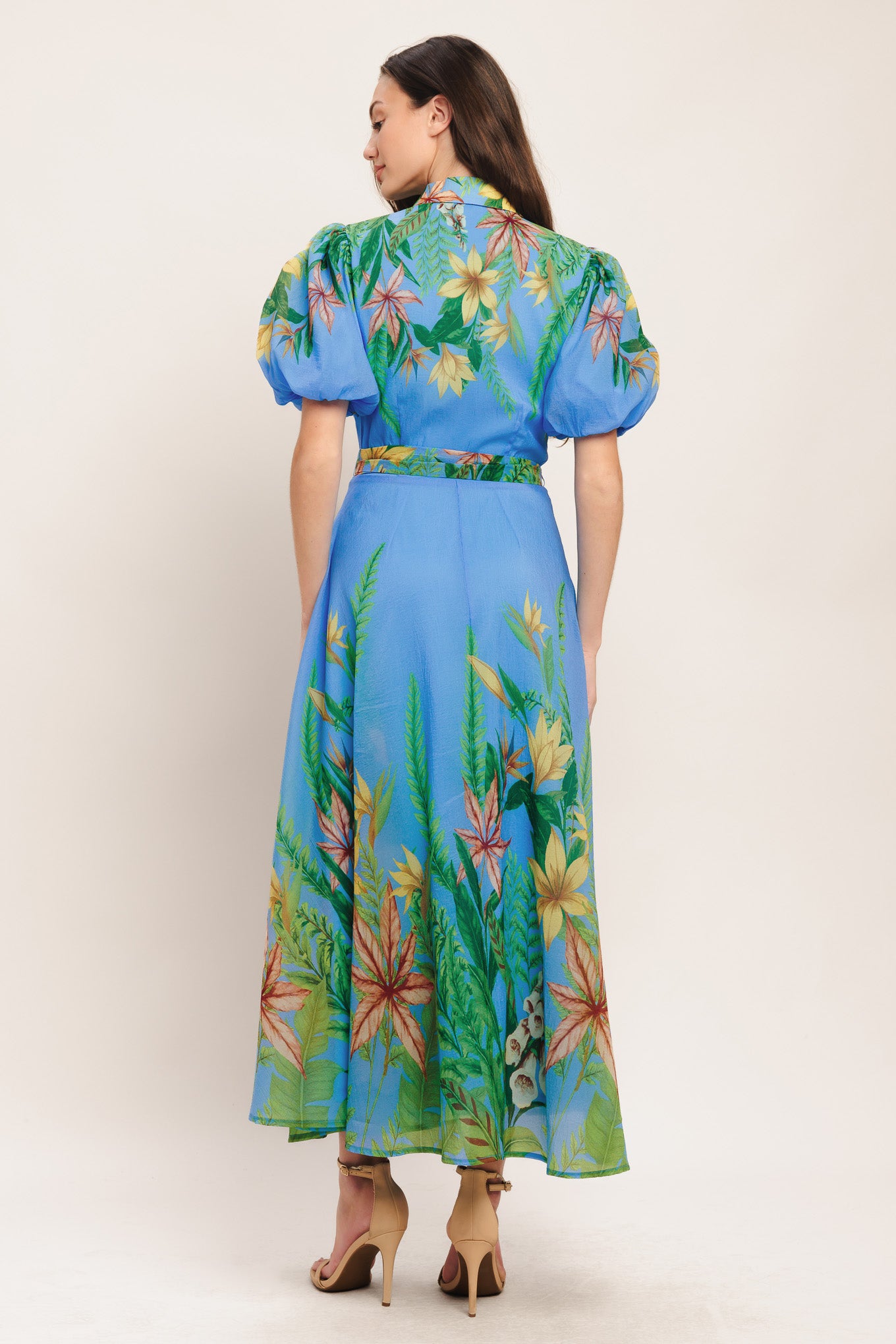 A printed woven midi dress featuring collar, short puff sleeve, button down, circle skirt and self sash tie

Details:

Self: 100% Polyester

Lining: 100% Polyester

Size & Fit

-Model is 5`8" And Wearing Size Small
-Measurements Taken From Size Small
-Approx. Length: 54"