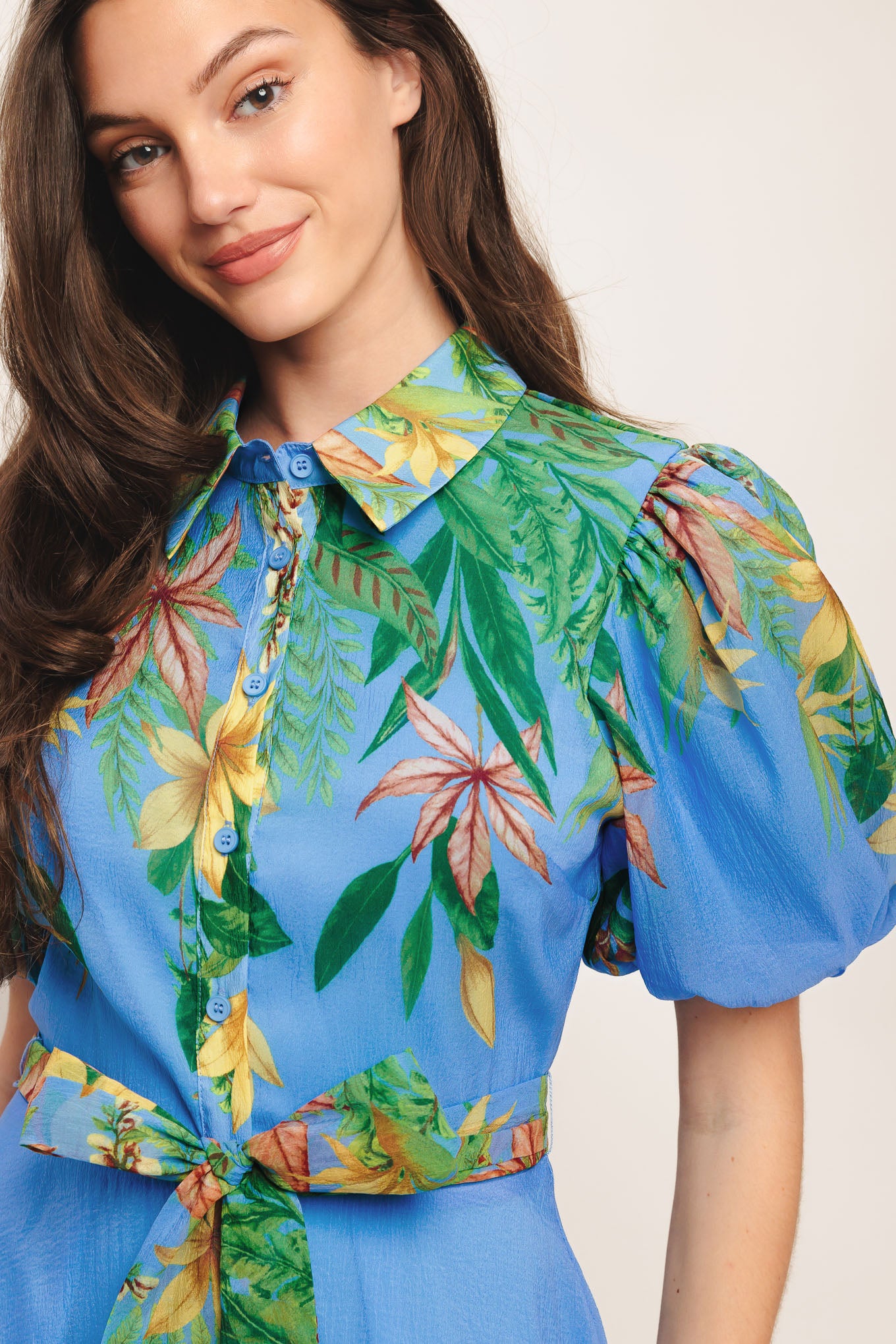 A printed woven midi dress featuring collar, short puff sleeve, button down, circle skirt and self sash tie

Details:

Self: 100% Polyester

Lining: 100% Polyester

Size & Fit

-Model is 5`8" And Wearing Size Small
-Measurements Taken From Size Small
-Approx. Length: 54"