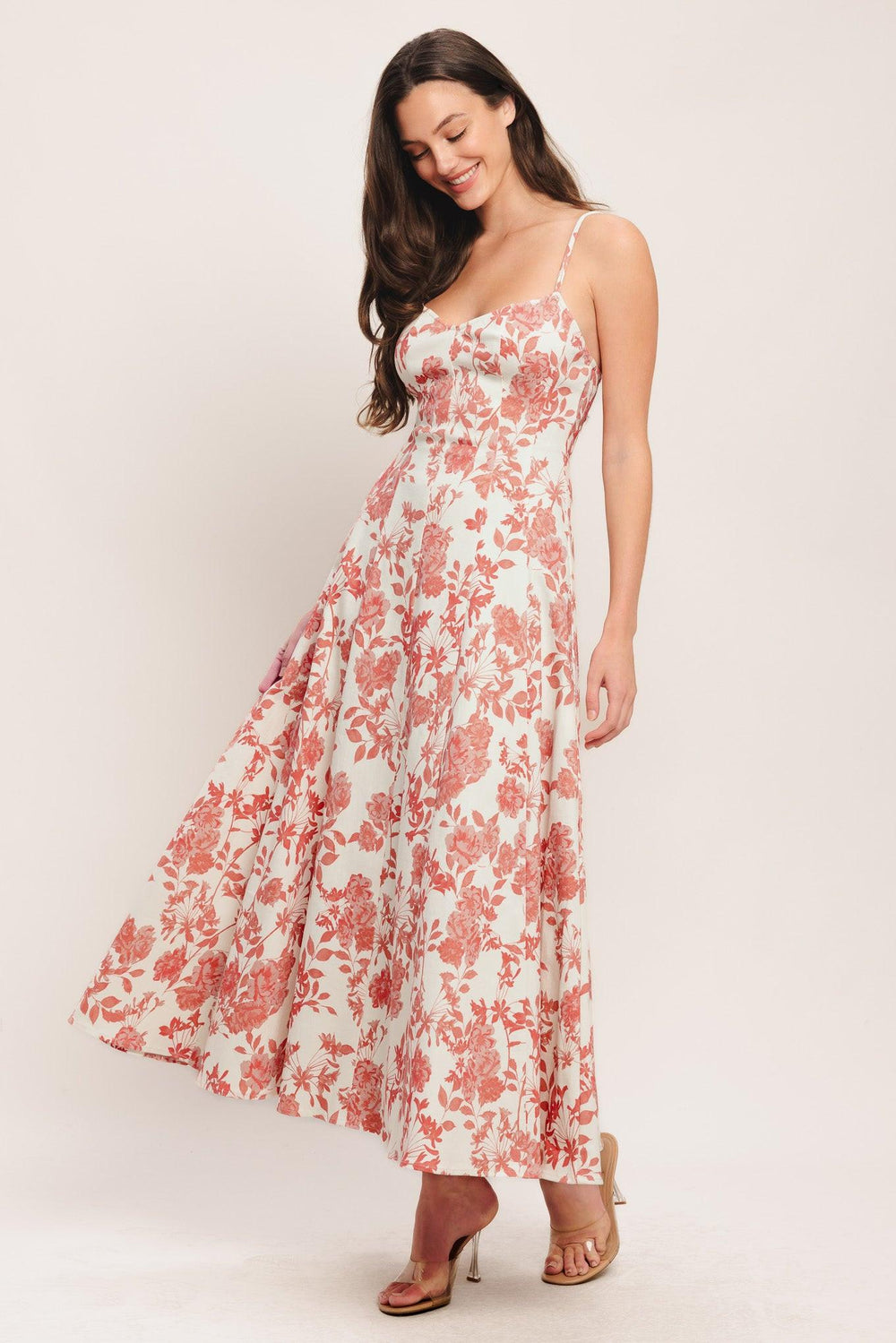 A printed woven midi dress featuring cami top, circle skirt and back zipper closure

Details:

Self: 97% Cotton 3% Spandex

Size & Fit

-Model is 5`8" And Wearing Size Small
-Measurements Taken From Size Small
-Approx. Length: 52"