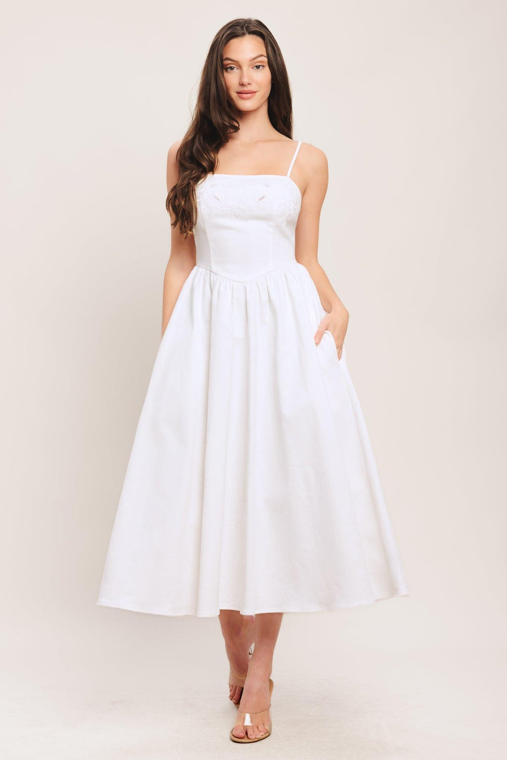 A solid woven midi dress featuring straight neckline, straps, embroidered bodice, basque waist and back zipper closure

Details:

Self: 97% Cotton 3% Spandex

Size & Fit

-Model is 5`8" And Wearing Size Small
-Measurements Taken From Size Small
-Approx. Length: 48"