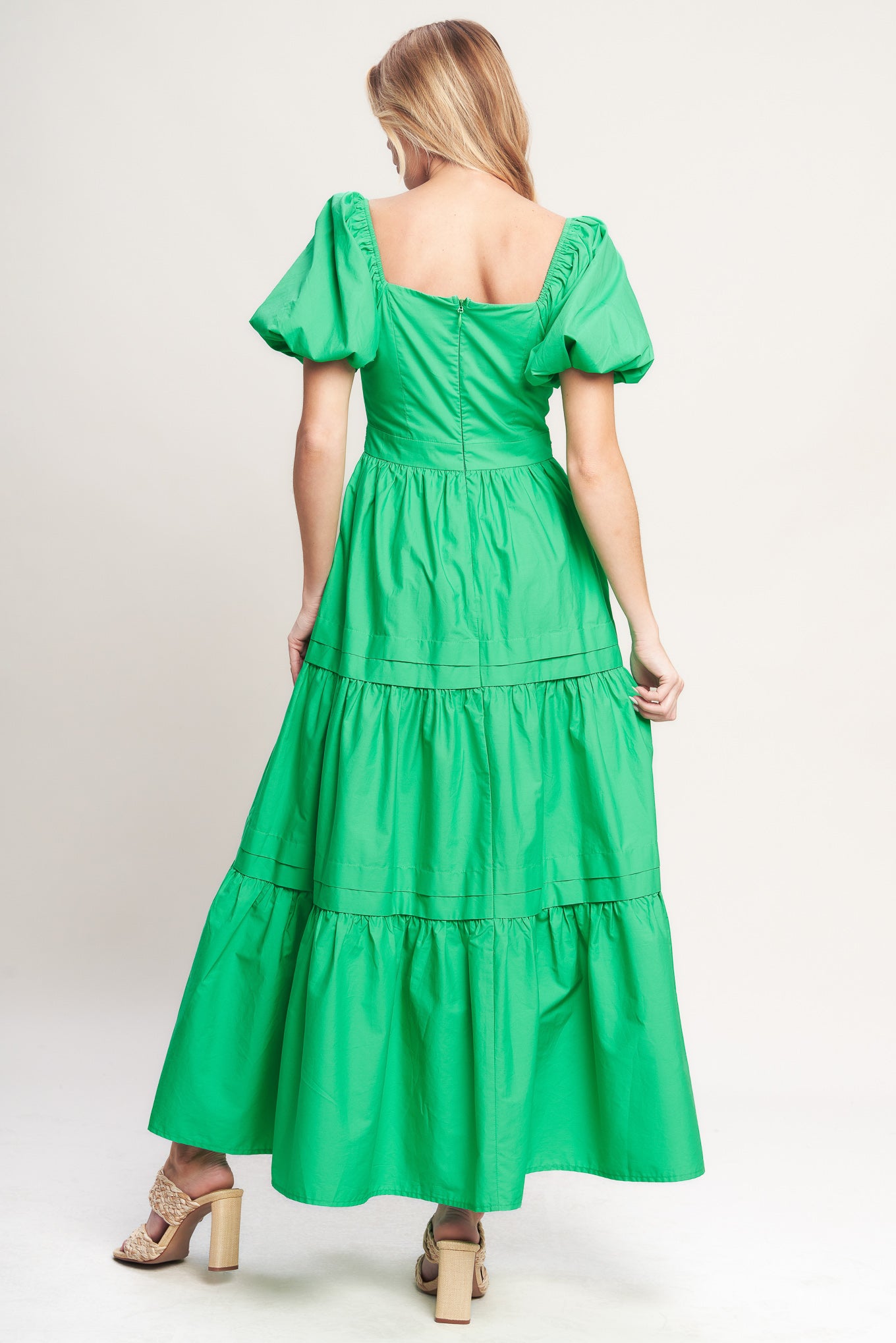 A solid woven maxi dress featuring sweetheart neckline, short puff sleeve, lace contrast waistband, tiered skirt and back zipper closure

Details:

Self: 100% Cotton

Lining: 100% Polyester

Size & Fit

-Model is 5`8" And Wearing Size Small
-Measurements Taken From Size Small
-Approx. Length: 54"