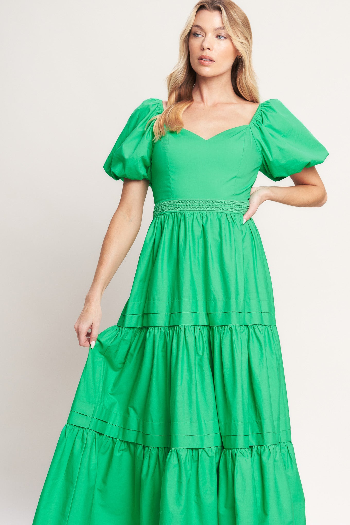 A solid woven maxi dress featuring sweetheart neckline, short puff sleeve, lace contrast waistband, tiered skirt and back zipper closure

Details:

Self: 100% Cotton

Lining: 100% Polyester

Size & Fit

-Model is 5`8" And Wearing Size Small
-Measurements Taken From Size Small
-Approx. Length: 54"