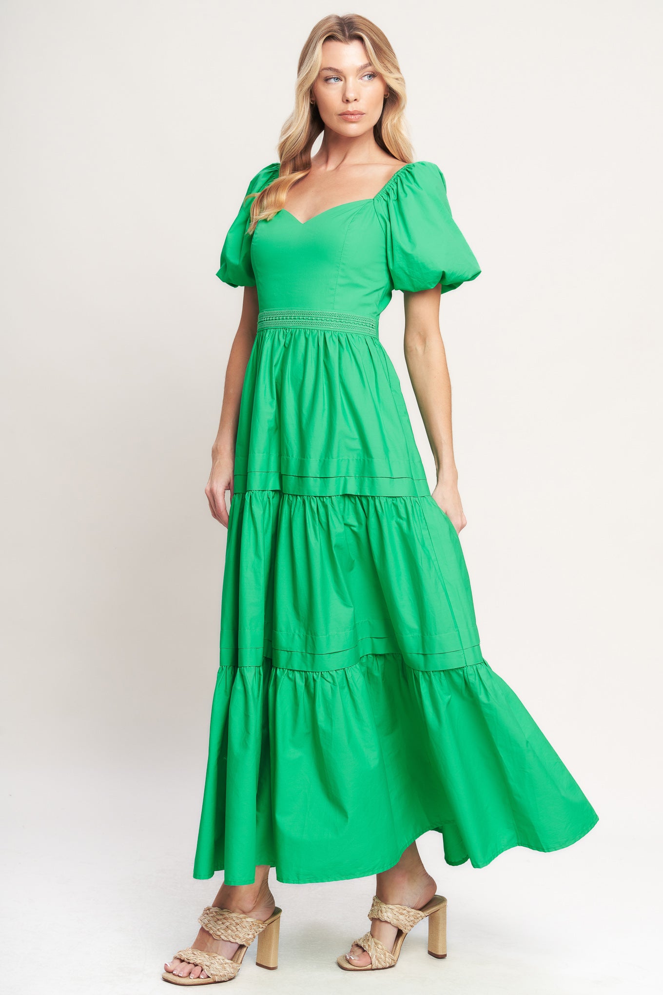 A solid woven maxi dress featuring sweetheart neckline, short puff sleeve, lace contrast waistband, tiered skirt and back zipper closure

Details:

Self: 100% Cotton

Lining: 100% Polyester

Size & Fit

-Model is 5`8" And Wearing Size Small
-Measurements Taken From Size Small
-Approx. Length: 54"