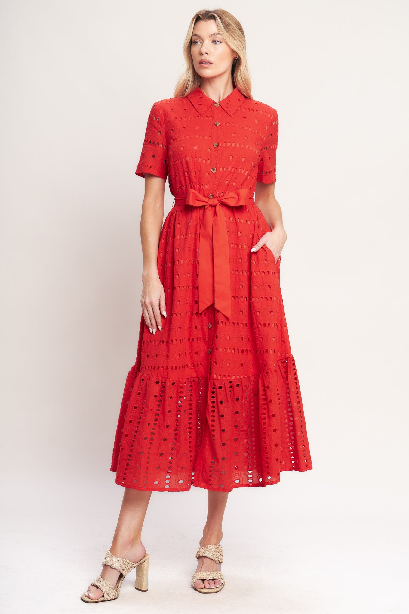 A woven eyelet midi dress featuring collar, short sleeve, front button down, self sash and ruffle hem

Details:

Self: 100% Cotton

Contrast: 100% Cotton

Lining: 100% Polyester

Size & Fit

-Model is 5`8" And Wearing Size Small
-Measurements Taken From Size Small
-Approx. Length: 51"
