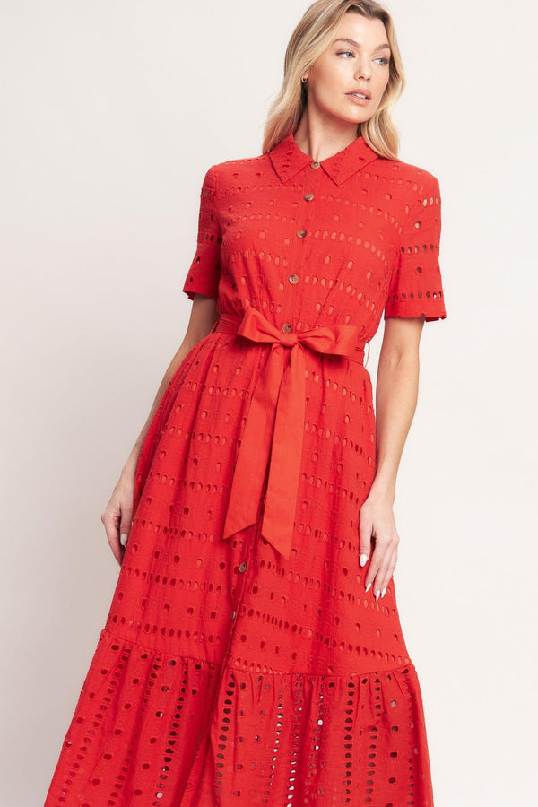 A woven eyelet midi dress featuring collar, short sleeve, front button down, self sash and ruffle hem

Details:

Self: 100% Cotton

Contrast: 100% Cotton

Lining: 100% Polyester

Size & Fit

-Model is 5`8" And Wearing Size Small
-Measurements Taken From Size Small
-Approx. Length: 51"