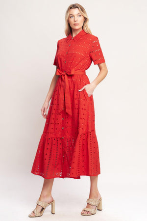 A woven eyelet midi dress featuring collar, short sleeve, front button down, self sash and ruffle hem

Details:

Self: 100% Cotton

Contrast: 100% Cotton

Lining: 100% Polyester

Size & Fit

-Model is 5`8" And Wearing Size Small
-Measurements Taken From Size Small
-Approx. Length: 51"
