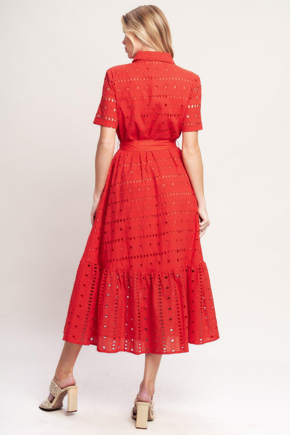A woven eyelet midi dress featuring collar, short sleeve, front button down, self sash and ruffle hem

Details:

Self: 100% Cotton

Contrast: 100% Cotton

Lining: 100% Polyester

Size & Fit

-Model is 5`8" And Wearing Size Small
-Measurements Taken From Size Small
-Approx. Length: 51"