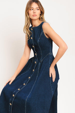 A denim midi dress featuring round neckline, sleeveless, front button down and circle skirt

Details:

Self: 55% Cotton 33% Polyester 10% Viscose 2% Spandex

Size & Fit

-Model is 5`8" And Wearing Size Small
-Measurements Taken From Size Small
-Approx. Length: 48"