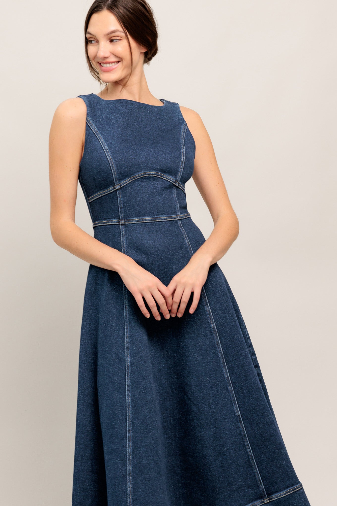 
A washed denim midi dress featuring wide neckline, sleeveless, waist yoke, circle skirt and back zipper closure

Details:

Self : 55% Cotton 33% Polyester 10% Viscose 2% Spandex

Size &amp; Fit

- Model is 5`8" And Wearing Size Small
- Measurements Taken From Size Small
- Approx. Length: 48" Flying Tomato