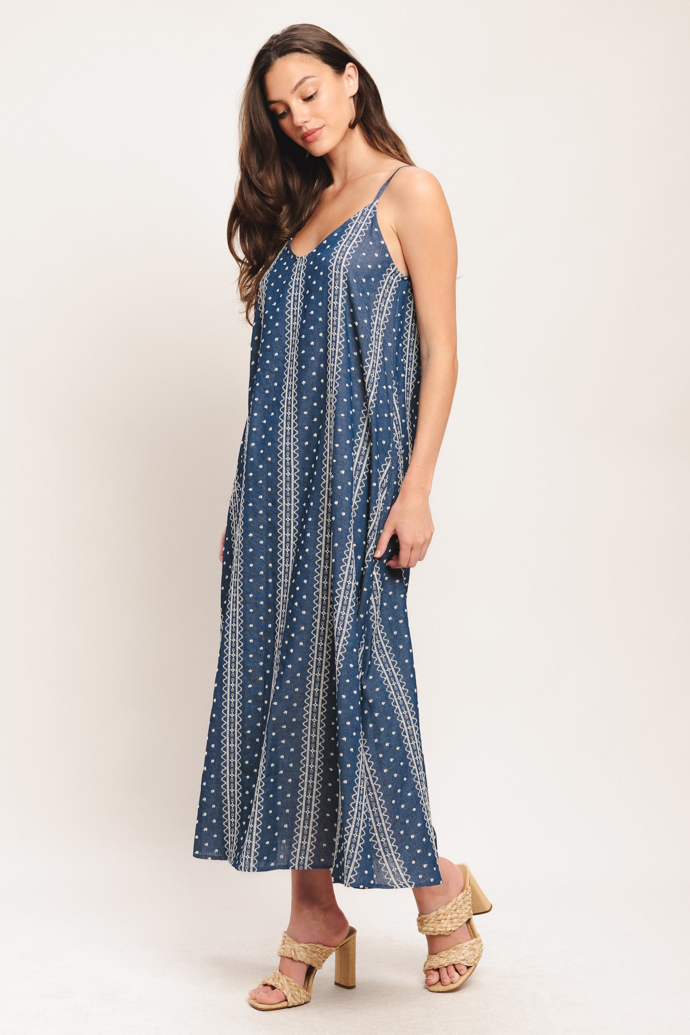 An embroidered woven midi dress featuring V neckline, straps and back tassel tie detail

Details:

Self: 65% Cotton 35% Polyester

Contrast: 65% Cotton 35% Polyester Exclusive of Decoration

Size & Fit

-Model is 5`8" And Wearing Size Small
-Measurements Taken From Size Small
-Approx. Length: 52"