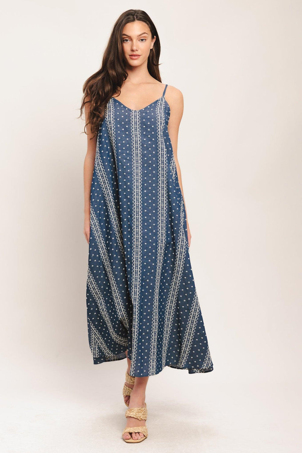 An embroidered woven midi dress featuring V neckline, straps and back tassel tie detail

Details:

Self: 65% Cotton 35% Polyester

Contrast: 65% Cotton 35% Polyester Exclusive of Decoration

Size & Fit

-Model is 5`8" And Wearing Size Small
-Measurements Taken From Size Small
-Approx. Length: 52"