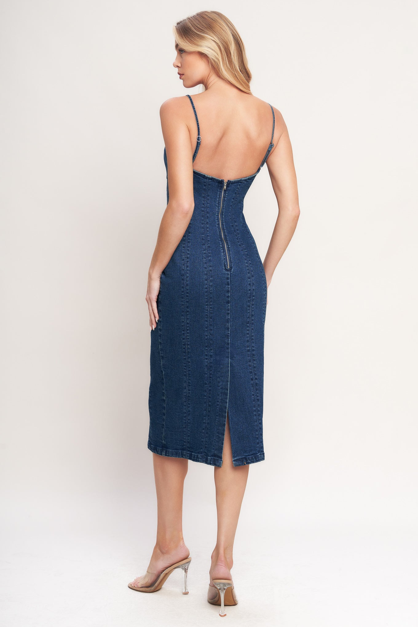 
A washed denim midi dress featuring sweetheart neckline, straps, H line skirt, low back and back zipper closure

Details:

Self : 99% Cotton 1% Spandex

Size &amp; Fit

- Model is 5`8" And Wearing Size Small
- Measurements Taken From Size Small
- Approx. Length: 49"