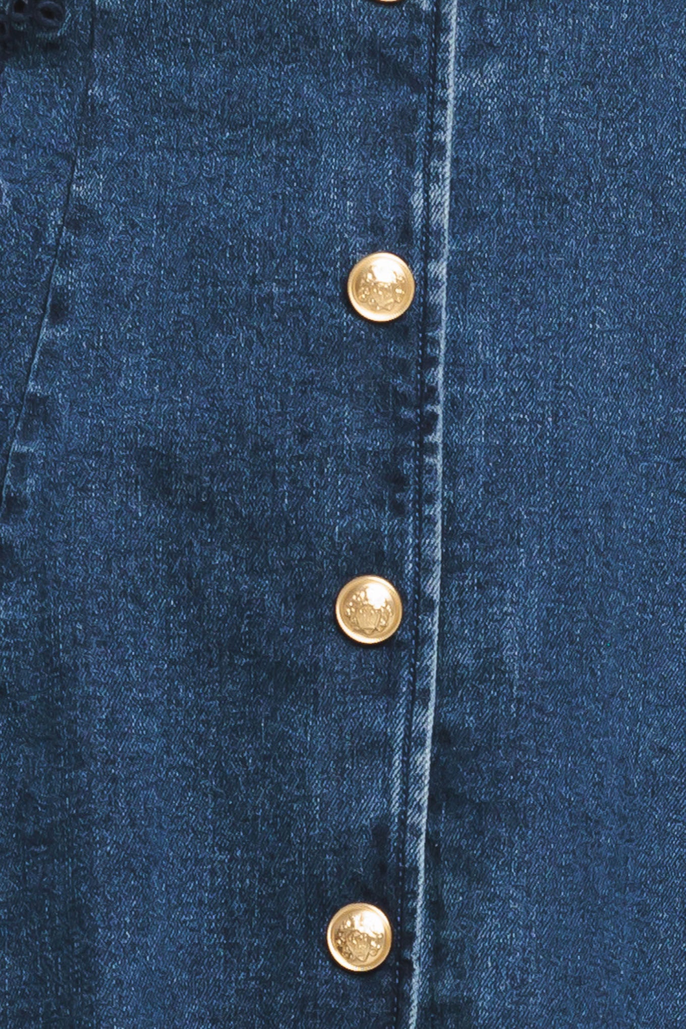 A washed denim mini dress featuring V neckline, sleeveless, non-functional front button down, circle skirt and back zipper closure

Details:

Self: 99% Cotton 1% Spandex

Size & Fit

-Model is 5`8" And Wearing Size Small
-Measurements Taken From Size Small
-Approx. Length: 34"