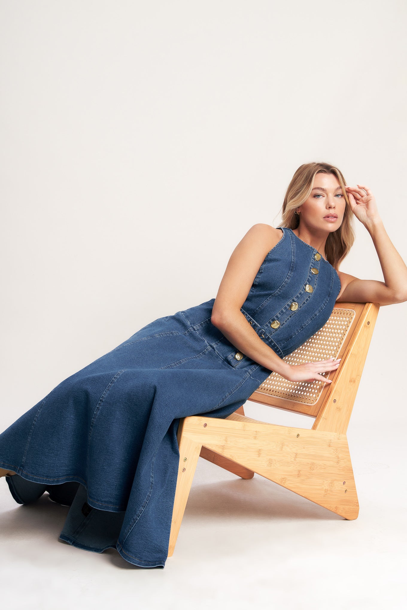 A washed denim mini dress featuring round neckline, sleeveless, button down, self belt and circle skirt

Details:

Self: 70% Cotton 28% Polyester 2% Spandex

Size & Fit

- Model is 5`8" And Wearing Size Small
- Measurements Taken From Size Small
- Approx. Length: 51"