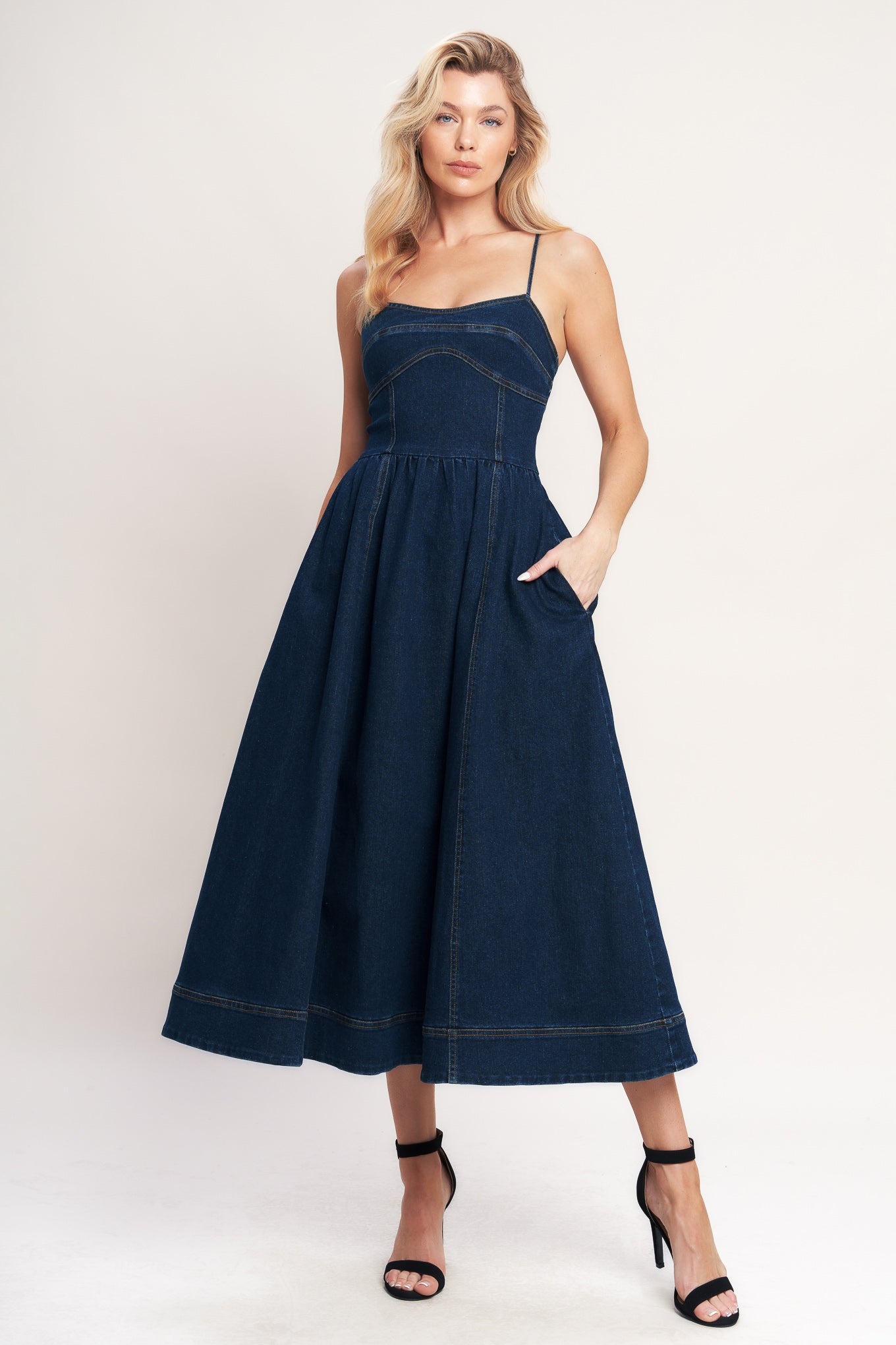 A denim midi dress featuring cami top, full skirt and back zipper closure

Details:

Self: 70% Cotton 28.5% Polyester 1.5% Spandex

Size & Fit

-Model is 5`8" And Wearing Size Small
-Measurements Taken From Size Small
-Approx. Length: 50"