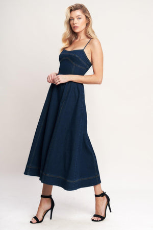 A denim midi dress featuring cami top, full skirt and back zipper closure

Details:

Self: 70% Cotton 28.5% Polyester 1.5% Spandex

Size & Fit

-Model is 5`8" And Wearing Size Small
-Measurements Taken From Size Small
-Approx. Length: 50"