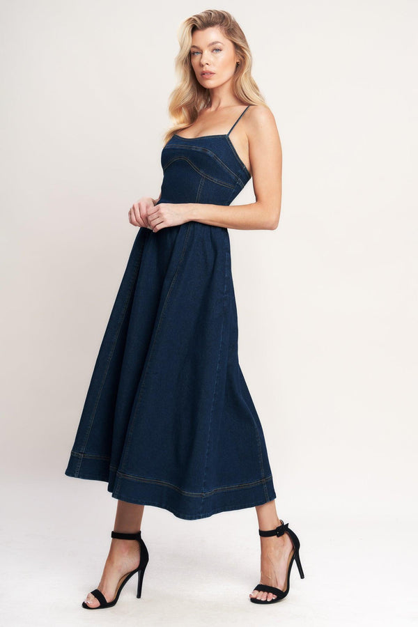 A denim midi dress featuring cami top, full skirt and back zipper closure

Details:

Self: 70% Cotton 28.5% Polyester 1.5% Spandex

Size & Fit

-Model is 5`8" And Wearing Size Small
-Measurements Taken From Size Small
-Approx. Length: 50"
