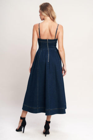 A denim midi dress featuring cami top, full skirt and back zipper closure

Details:

Self: 70% Cotton 28.5% Polyester 1.5% Spandex

Size & Fit

-Model is 5`8" And Wearing Size Small
-Measurements Taken From Size Small
-Approx. Length: 50"