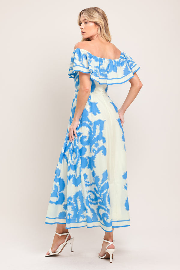 Woman wearing a blue and white patterned off the shoulder midi dress | Flying Tomato