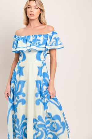 Woman wearing a blue and white patterned off the shoulder midi dress | Flying Tomato