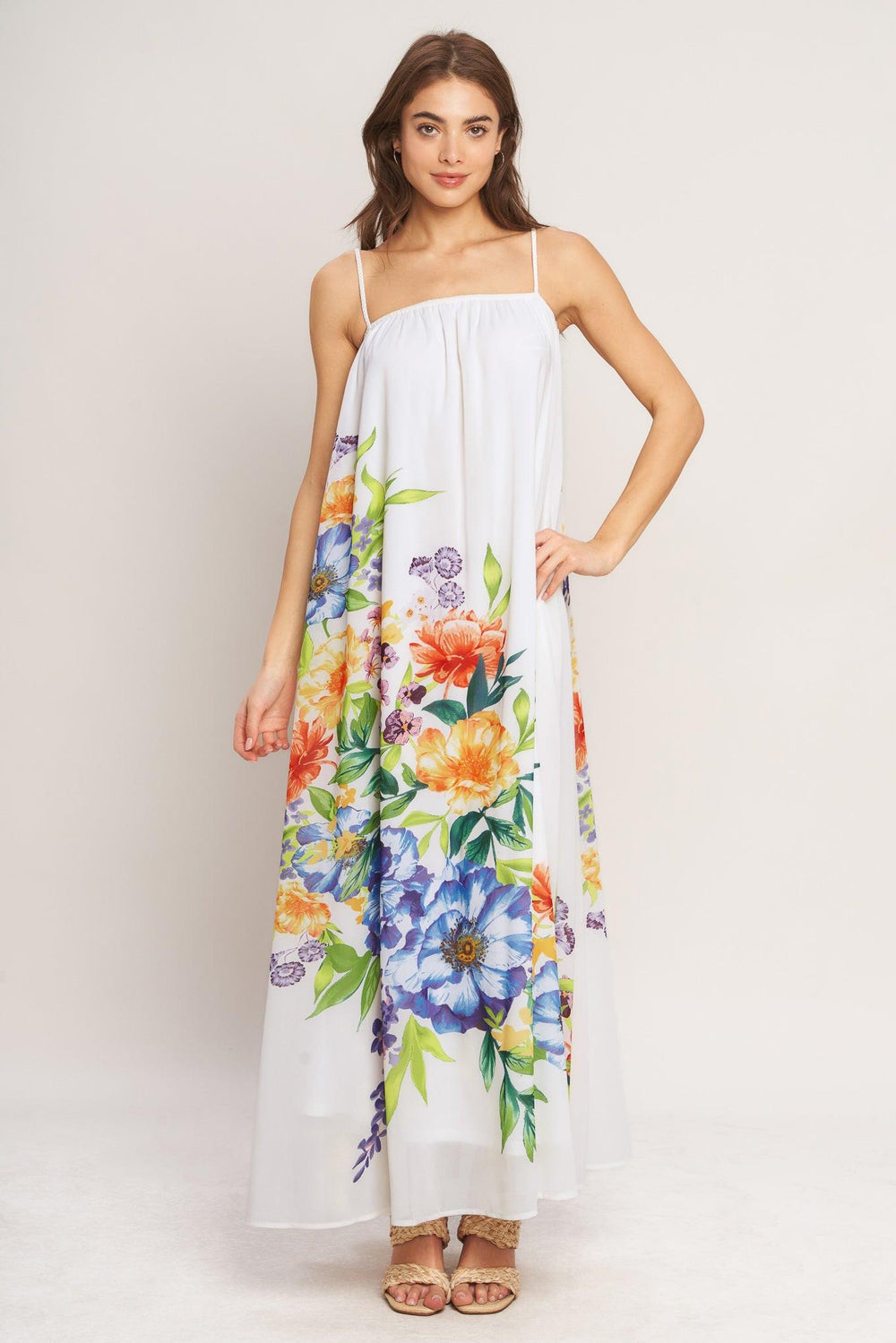 A printed woven ankle dress featuring straight neckline with straps and low back with tie