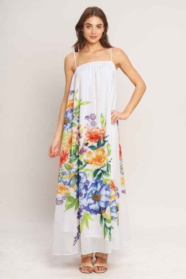 A printed woven ankle dress featuring straight neckline with straps and low back with tie
