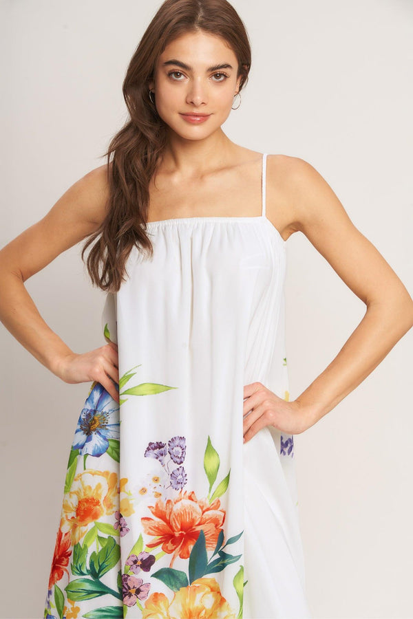 A printed woven ankle dress featuring straight neckline with straps and low back with tie