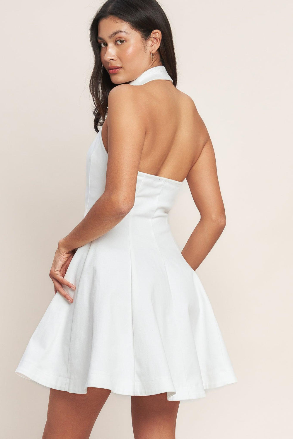 White sleeveless mini dress with a collared neckline, fitted bodice, and gold button front

Details:

Self: 97% Cotton 3% Spandex

Size & Fit

- Model is 5`8" And Wearing Size Small
- Measurements Taken From Size Small
- Approx. Length: 35"