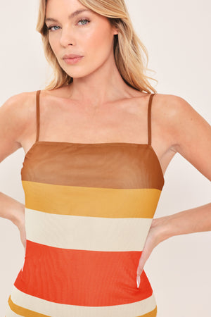 Woman wearing a colorful striped power mesh midi dress | Flying Tomato