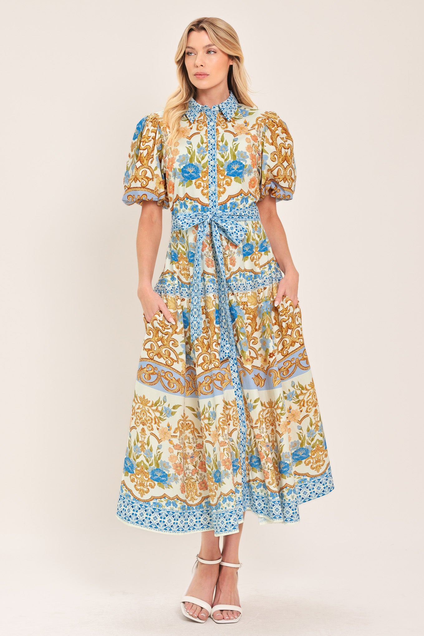 Woman wearing a patterned midi shirt dress with short sleeve and self sash tie | Flying Tomato