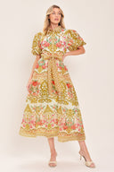 Woman wearing a floral and gold patterned midi shirt dress with short sleeve and self sash tie | Flying Tomato