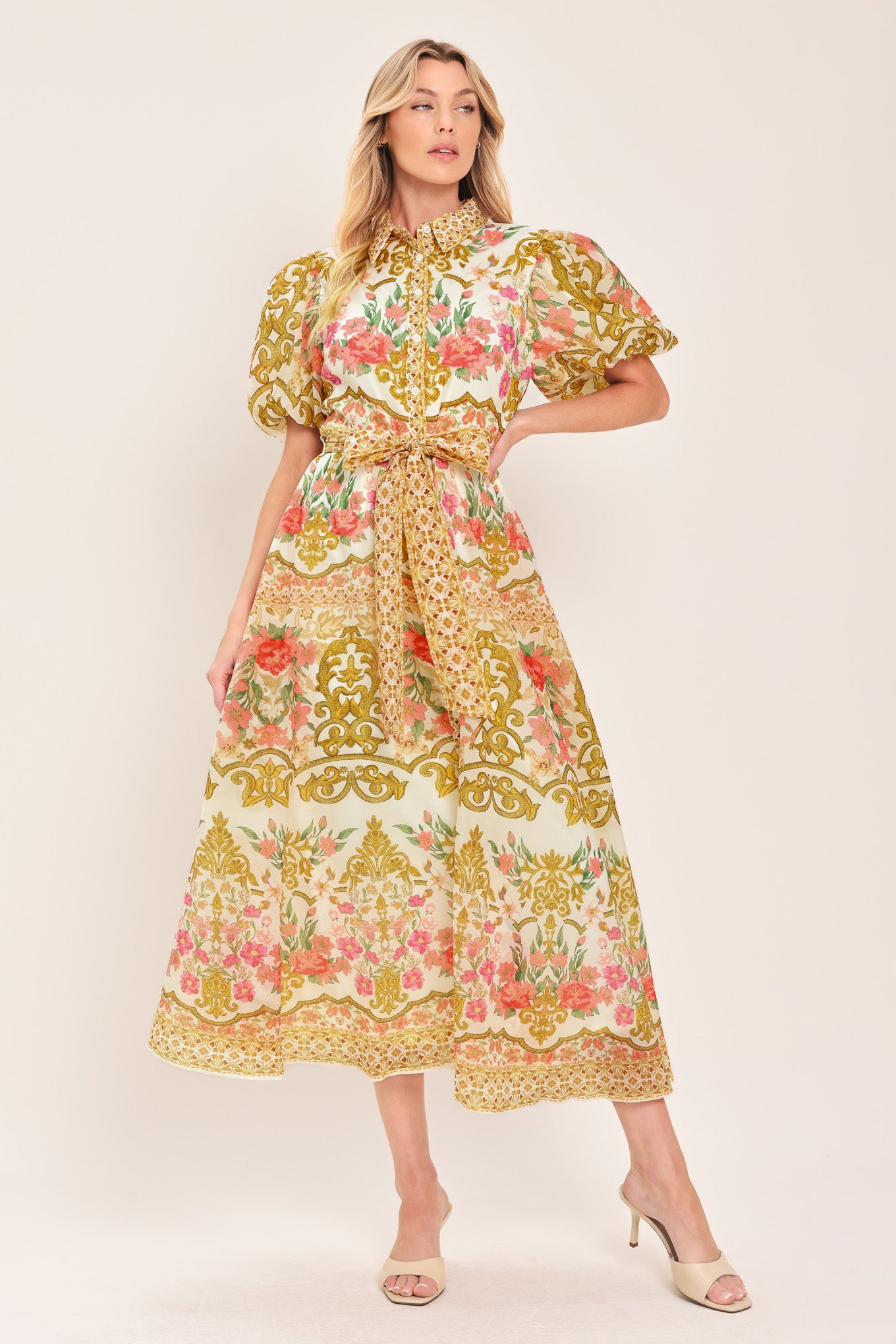 Woman wearing a floral and gold patterned midi shirt dress with short sleeve and self sash tie | Flying Tomato