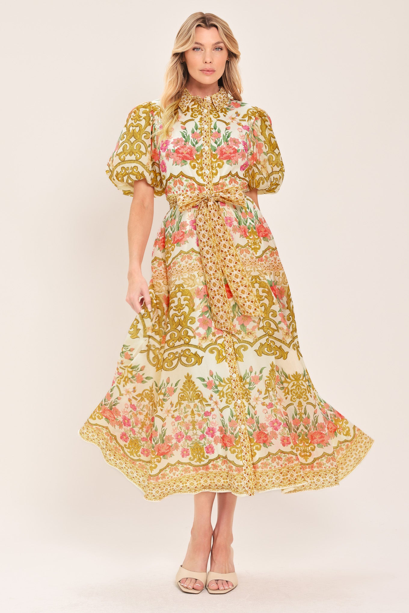 Woman wearing a floral and gold patterned midi shirt dress with short sleeve and self sash tie | Flying Tomato
