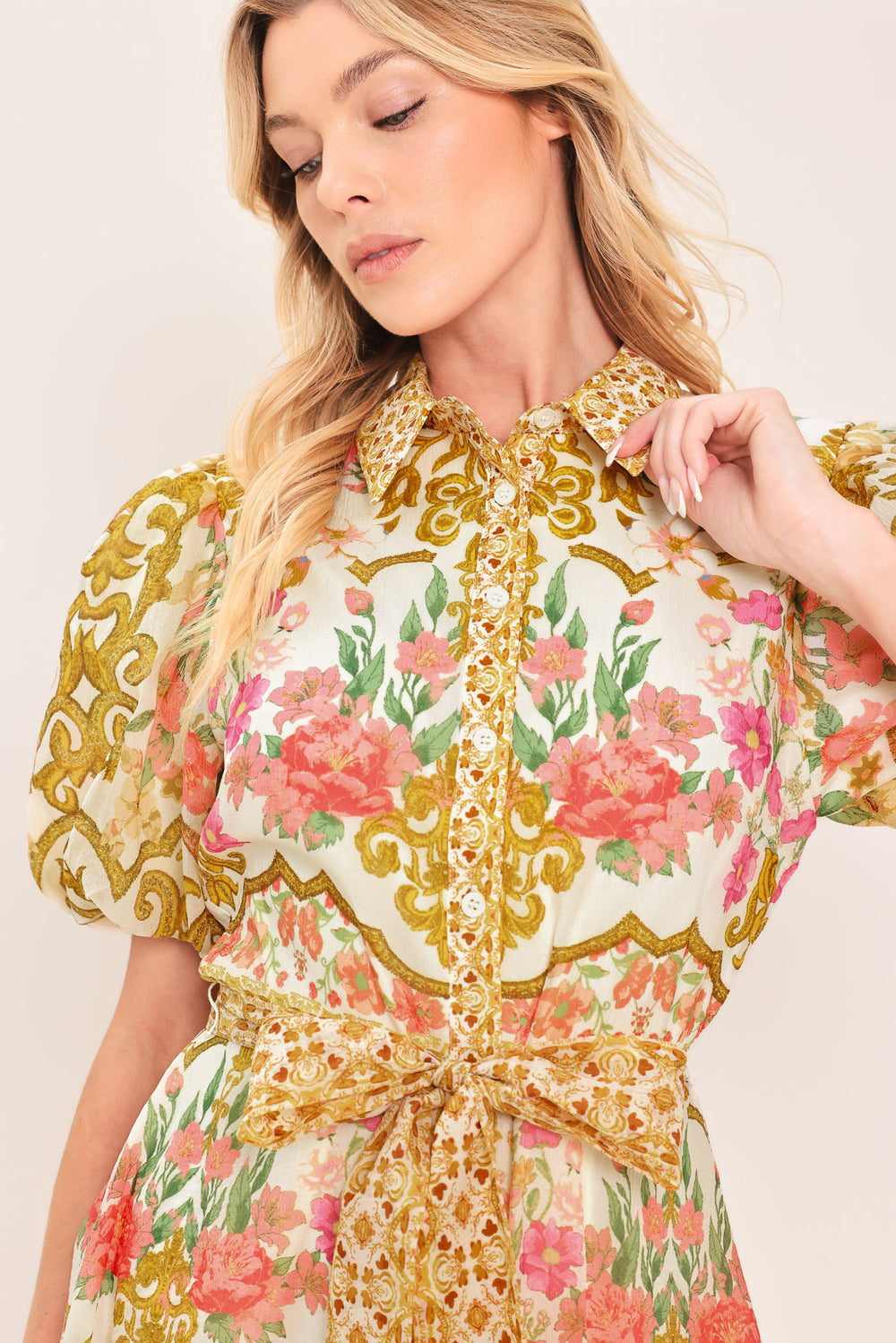 Woman wearing a floral and gold patterned midi shirt dress with short sleeve and self sash tie | Flying Tomato