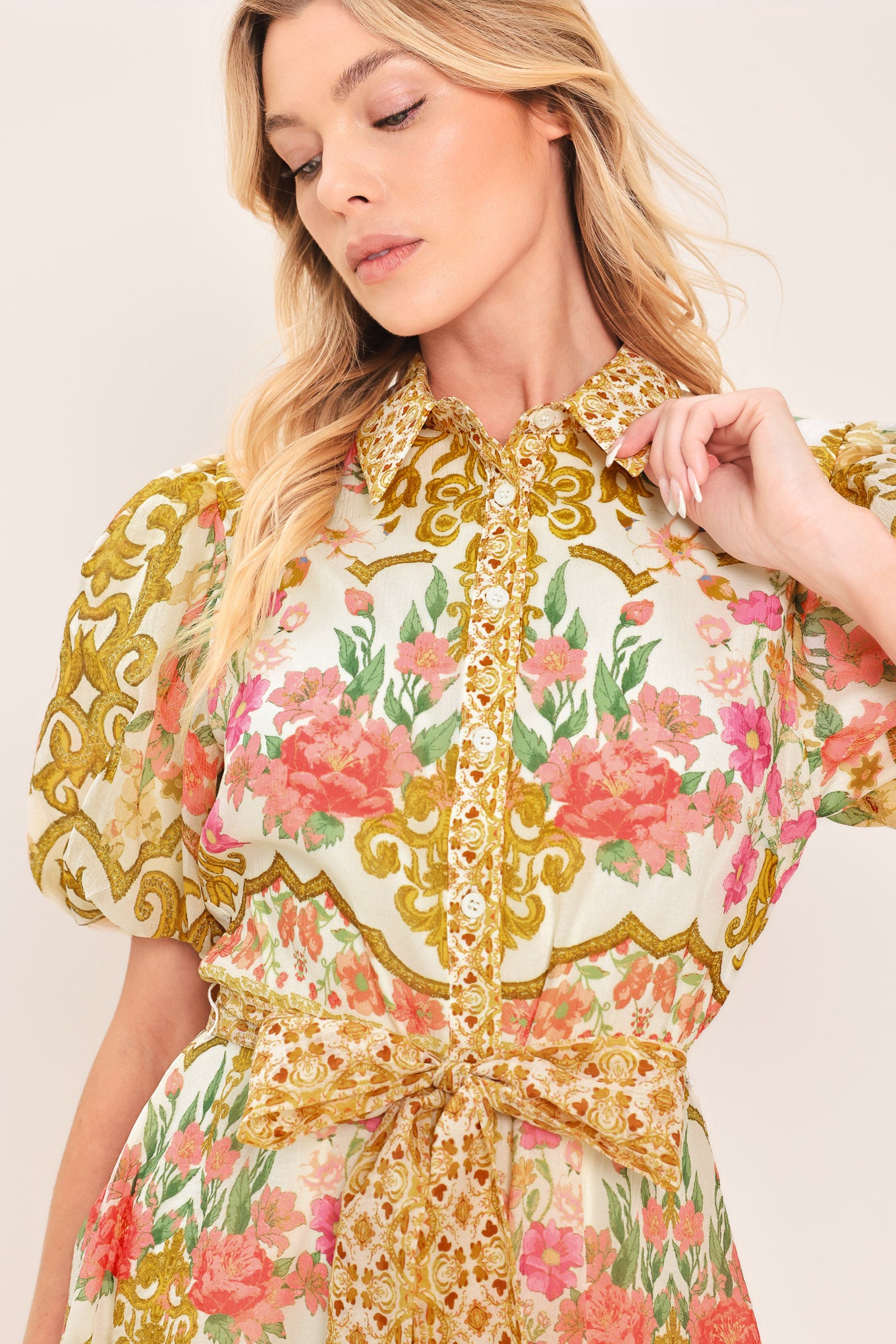 Woman wearing a floral and gold patterned midi shirt dress with short sleeve and self sash tie | Flying Tomato