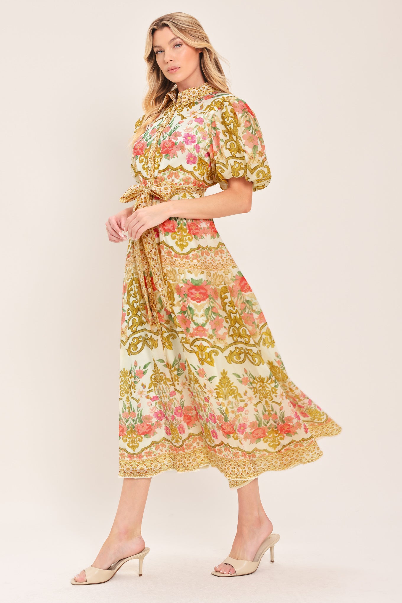 Woman wearing a floral and gold patterned midi shirt dress with short sleeve and self sash tie | Flying Tomato