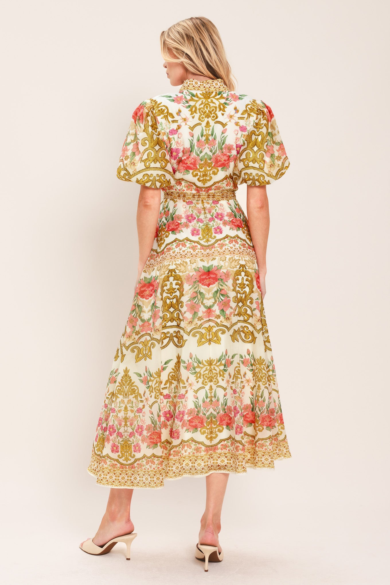 Woman wearing a floral and gold patterned midi shirt dress with short sleeve and self sash tie | Flying Tomato