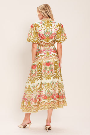 Woman wearing a floral and gold patterned midi shirt dress with short sleeve and self sash tie | Flying Tomato