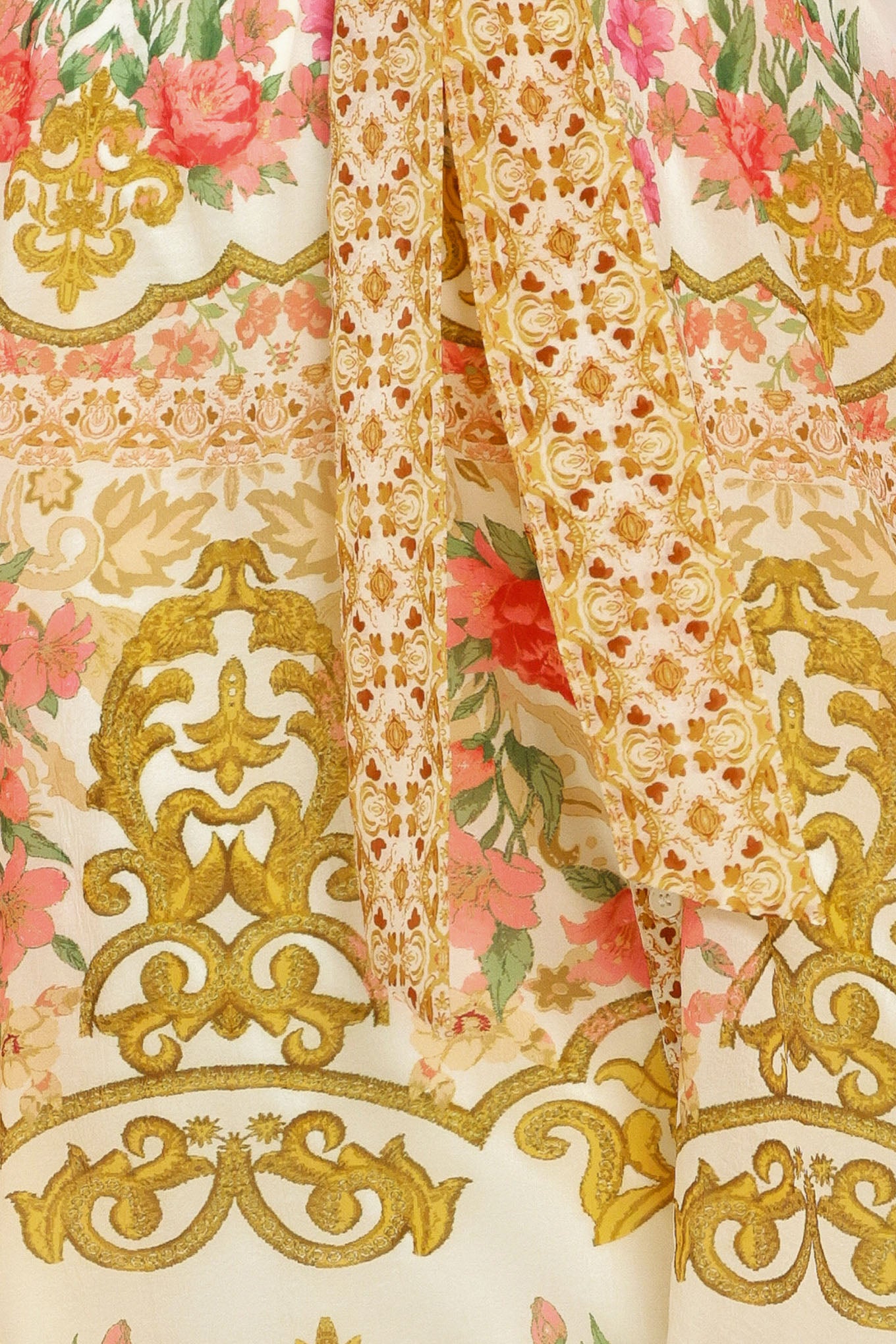 Close up of a floral and gold patterned midi shirt dress with short sleeve and self sash tie | Flying Tomato