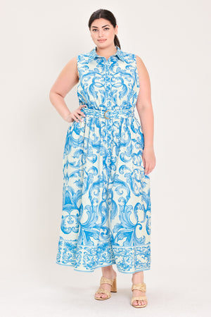 Woman wearing a blue and white patterned  maxi dress featuring collar, sleeveless, button down closure, self belt and full skirt  | Flying Tomato